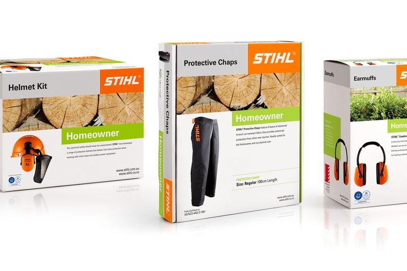 Stihl helmet kit, protective chaps and earmuffs packaging on a white background