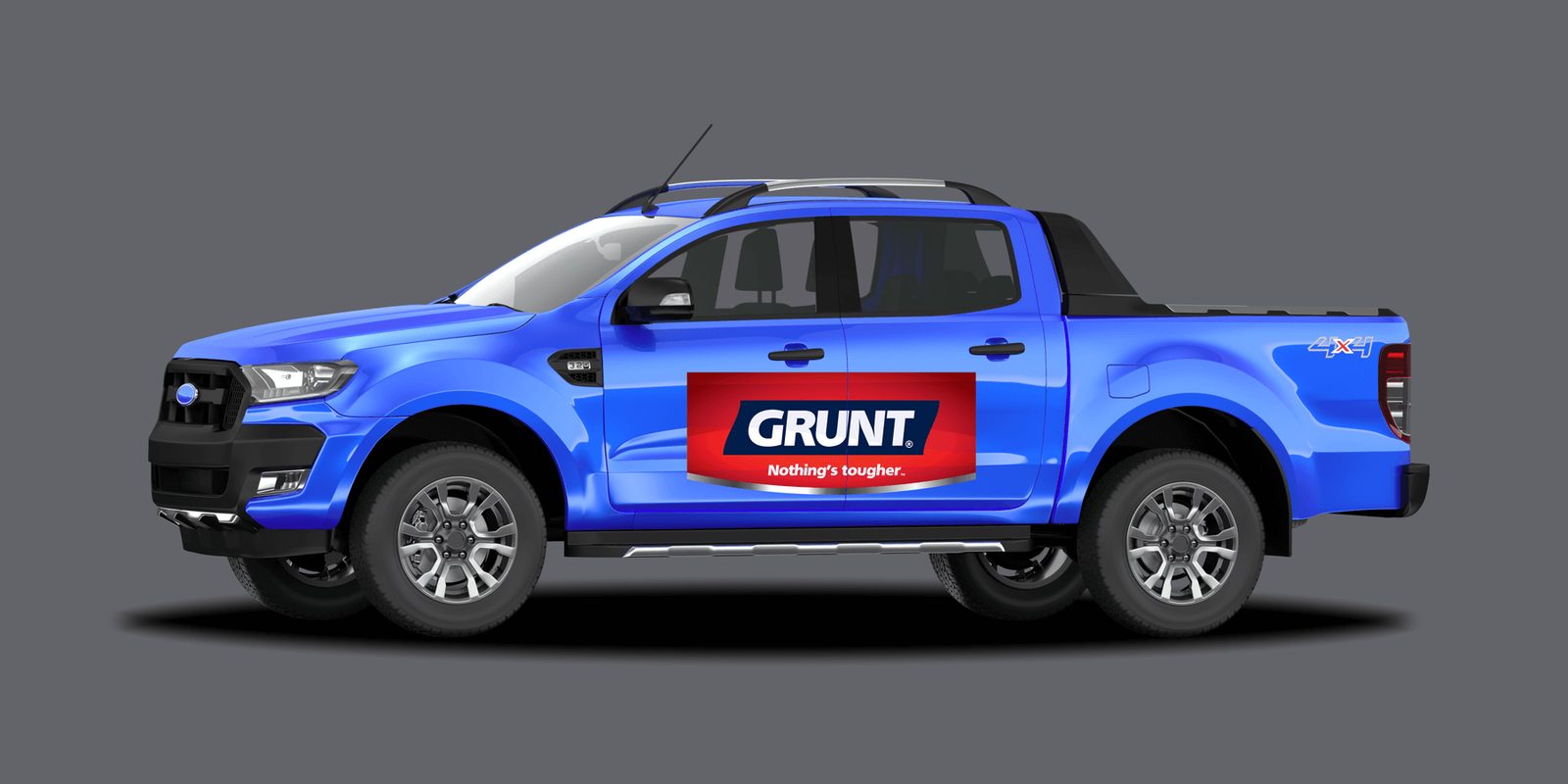 A blue utility vehicle with GRUNT branding