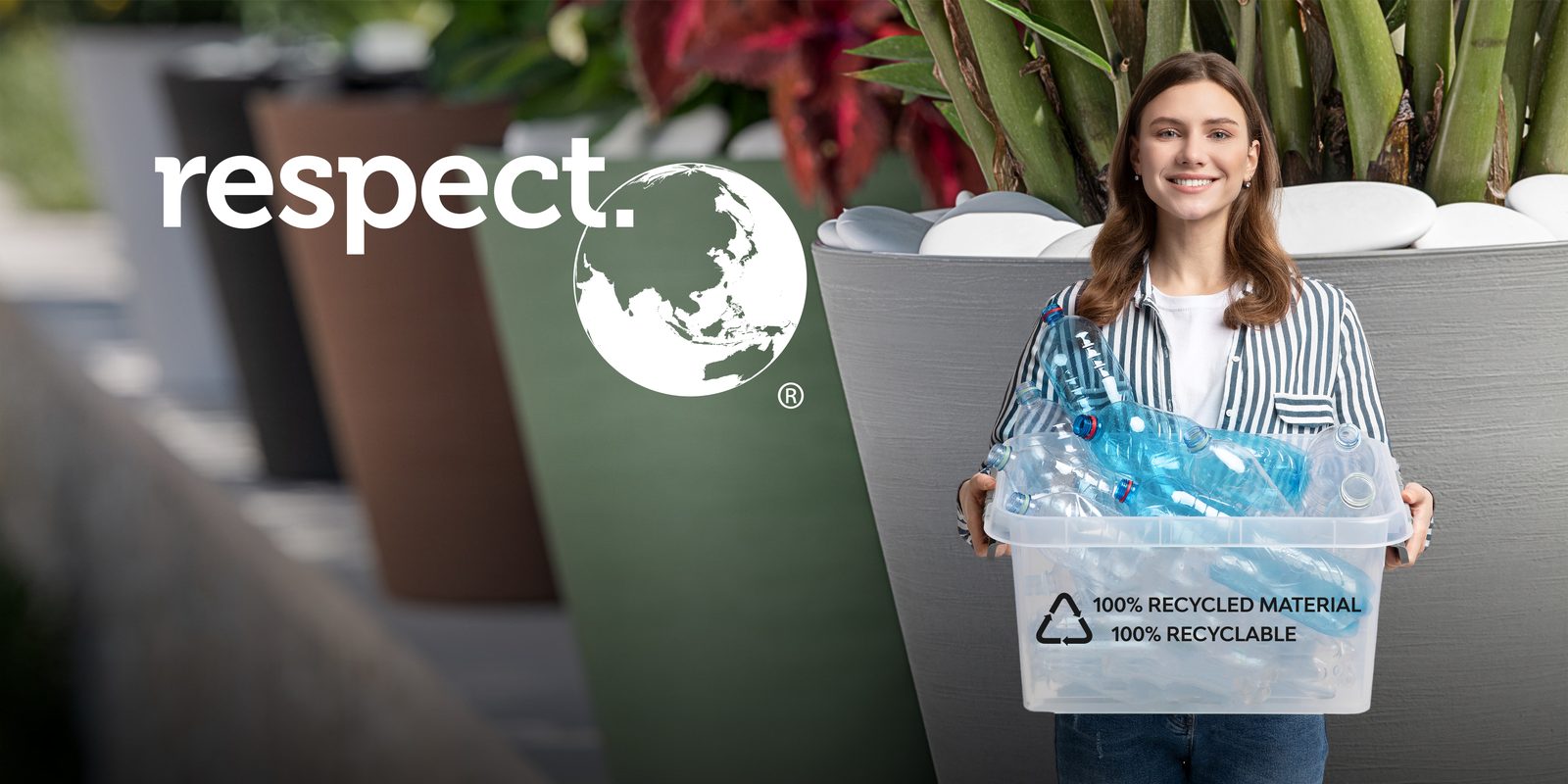 A woman holding recycled bottles beside Respect planters