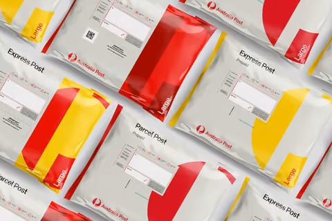 Australia Post parcel and satchel packaging in red, yellow and white